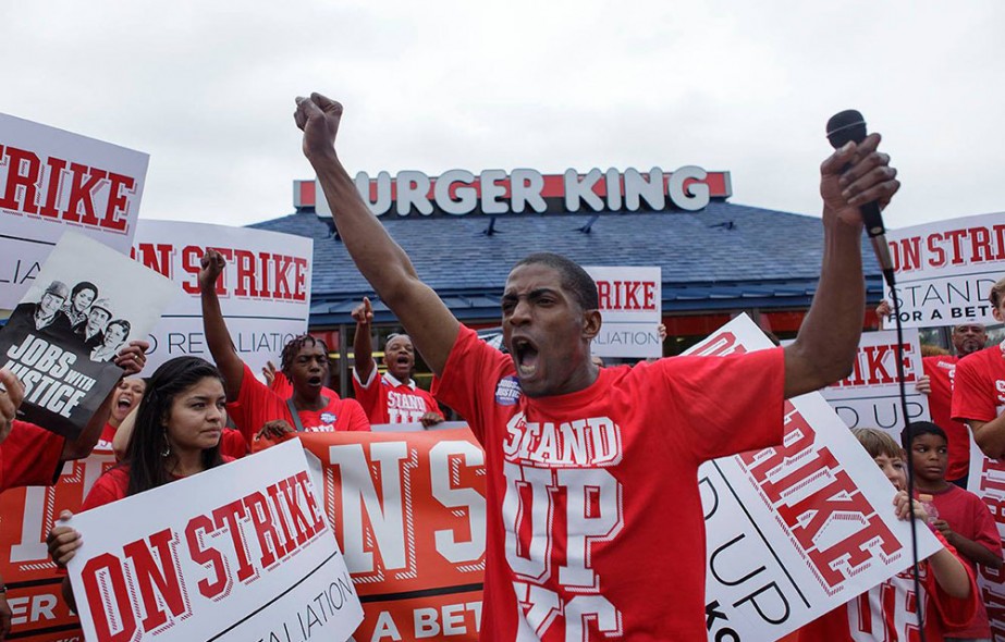 Fast food worker Terrance Wise rallies other fast food workers during a July 29, 2013 strike action in Kansas City.  This was the first event at the first strike event by fast food workers in Kansas City.  Wise works two fast food jobs to support his family.
